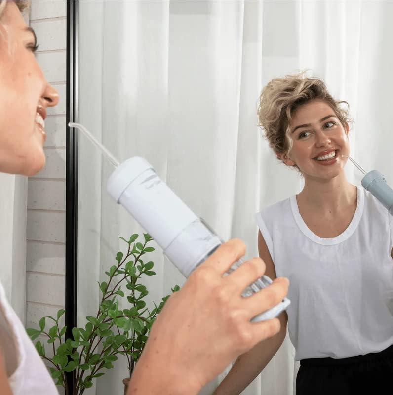 image:imageSNOW Whitening Water Flosser Rechargeable Water Flosser with Multiple Power Modes TravelFriendly amp Antibacterial Water Flosser for Teeth amp Mouth Collapsible amp Portable Tool for Oral Health