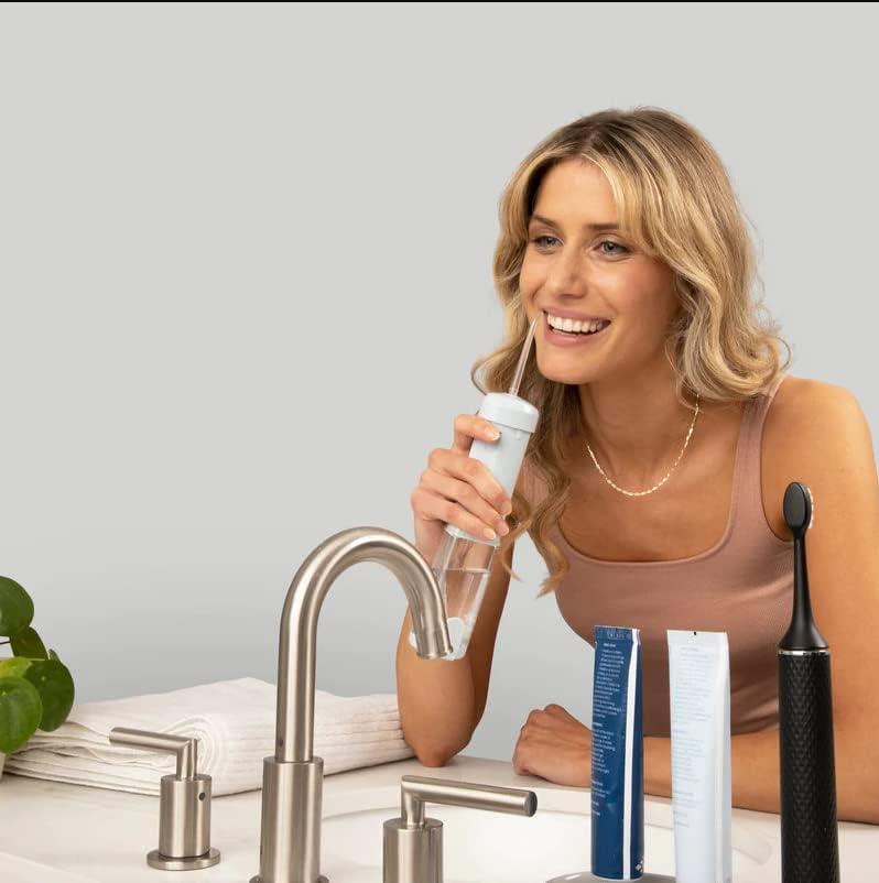 image:imageSNOW Whitening Water Flosser Rechargeable Water Flosser with Multiple Power Modes TravelFriendly amp Antibacterial Water Flosser for Teeth amp Mouth Collapsible amp Portable Tool for Oral Health